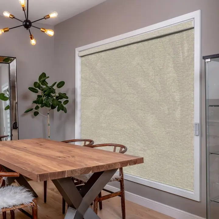 Luxe Light Filtering Roller in a dining room window